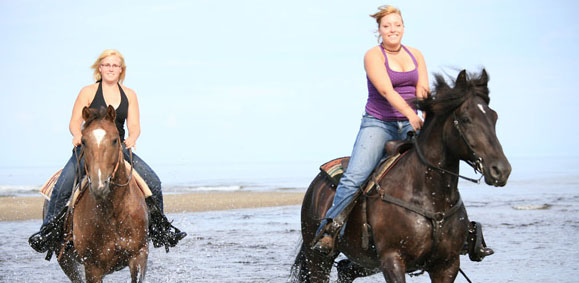 Promenade à cheval sur la plage
